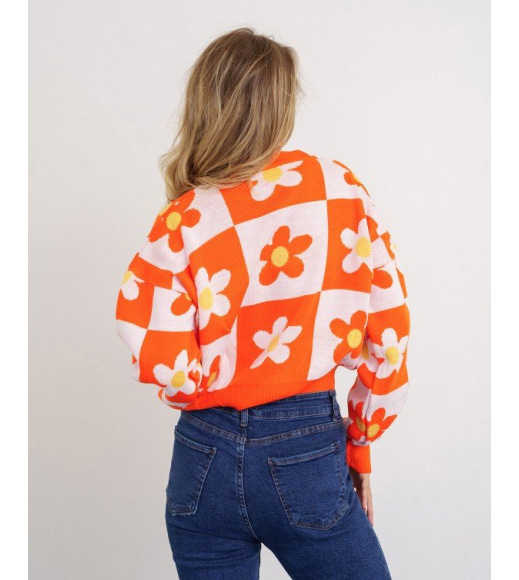 Оранжевый клетчатый свитер с цветочным декором