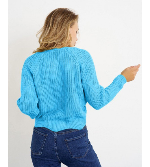 Синій трикотажний светр з фігурним низом