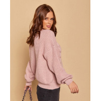 Рожевий вовняний светр комбінованої в`язки