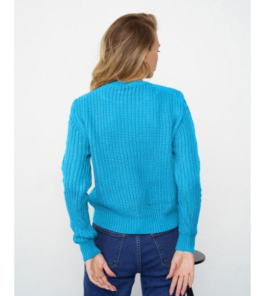Синій светр об'ємної в'язки