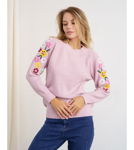 Рожевий трикотажний светр з квітковим візерунком