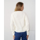 Білий трикотажний светр з аранами