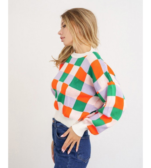 Зелено-молочний картатий светр