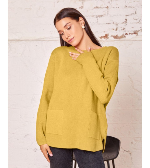 Гірчичний асиметричний светр з кишенями