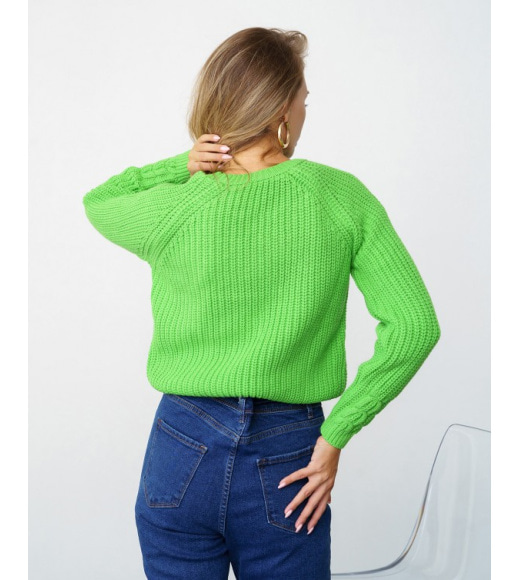 Салатовий трикотажний светр з аранами