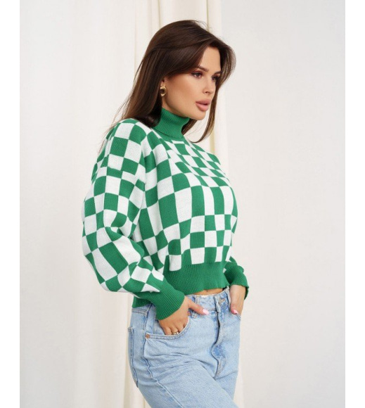 Зелений картатий светр з високим горлом