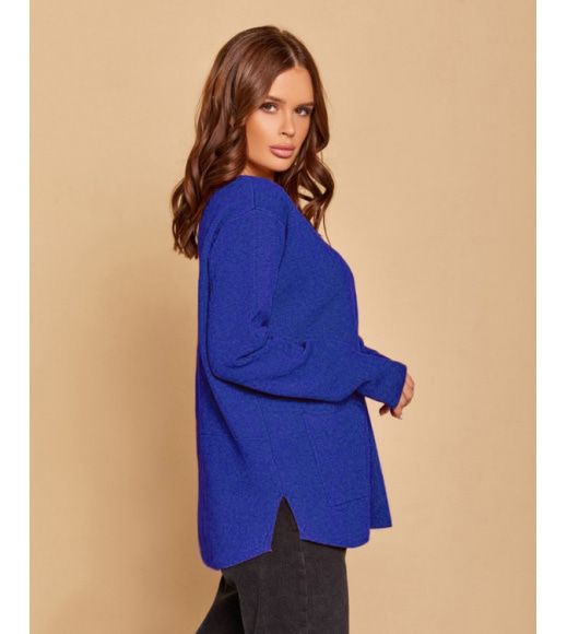 Синій асиметричний светр з кишенями