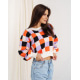 Об'ємний светр із кольоровими клітинами