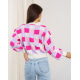 Об'ємний светр з рожево-бузковими клітинами