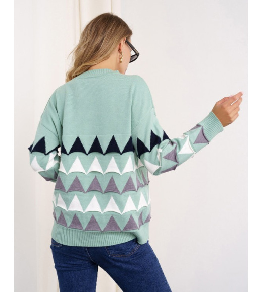 В'язаний м'ятний светр з об'ємними трикутниками