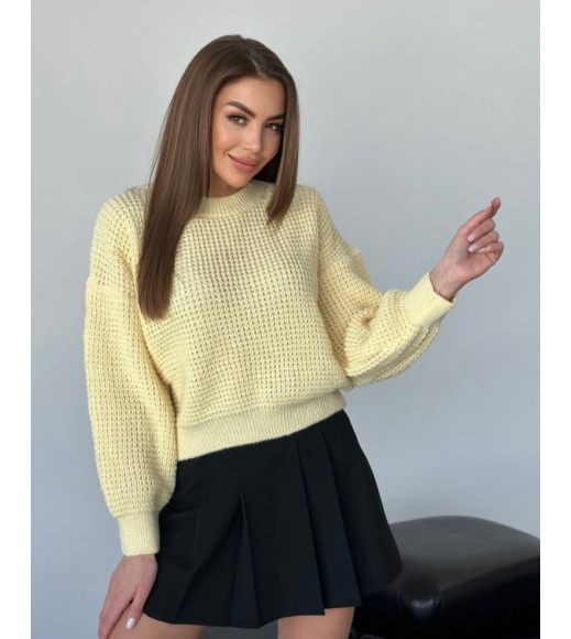 Желтый вязаный свитер из шерсти