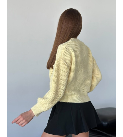 Жовтий в'язаний светр із вовни