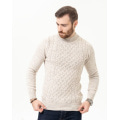 Бежевий вовняний светр з об'ємними візерунками