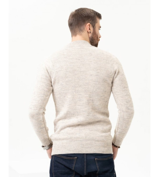 Бежевий вовняний светр з об'ємними візерунками
