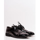 Черные классические туфли с лаковыми вставками